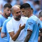 Pep Guardiola and Joao Cancelo