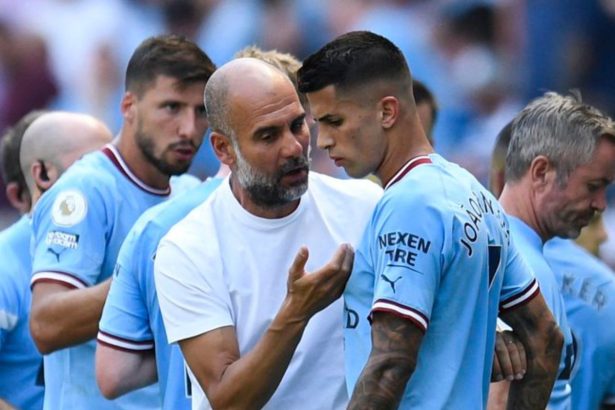 Pep Guardiola and Joao Cancelo