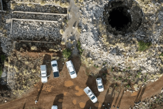 Illegal Miners Resurface but Flee Back Into Shaft as They See Police Presence