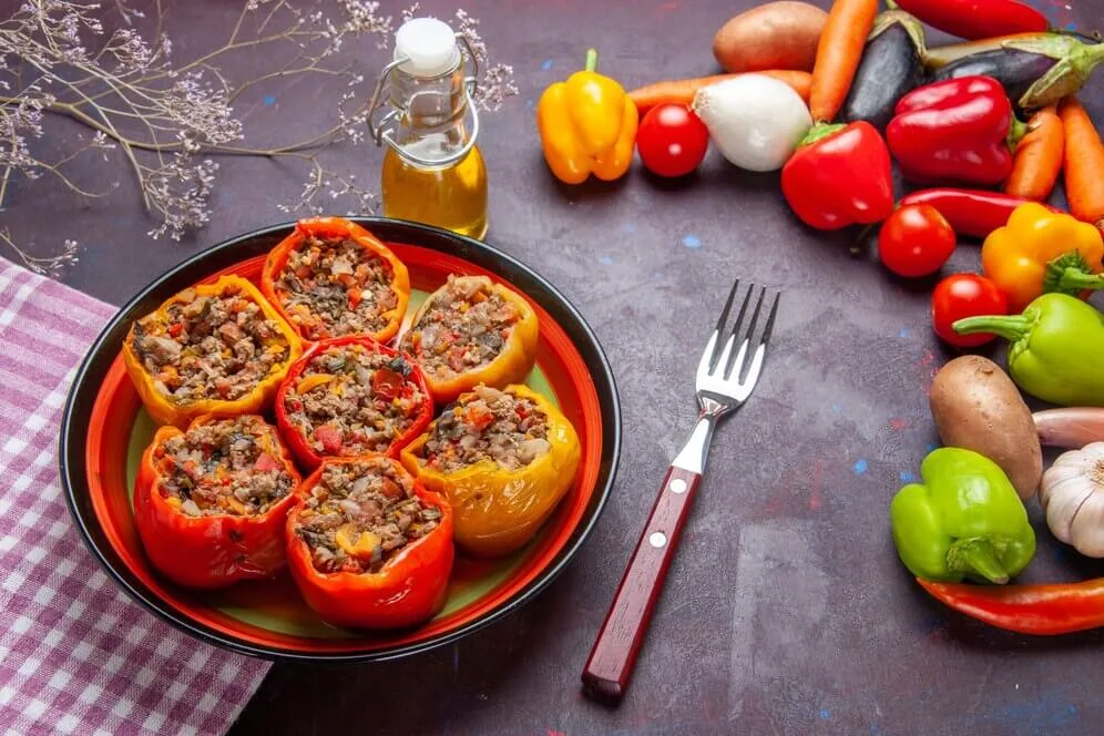 Top 15 Air Fryer Recipes You Should Try 62 front view cooked bell peppers with ground meat fresh vegetables dark surface meal vegetable food meat dolma 140725 74279 1
