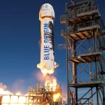 Bezos’ Blue Origin Delays New Glenn Rocket Launch, Challenging Musk in Space Race