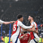 Mikel Merino celebrates scoring for Arsenal in a Premier League match against Leicester