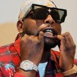 Fan Tries to Kiss DJ Maphorisa On Stage