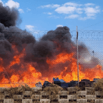 SA Breweries Depot in Soweto Catches Fire After Grass Blaze Spreads